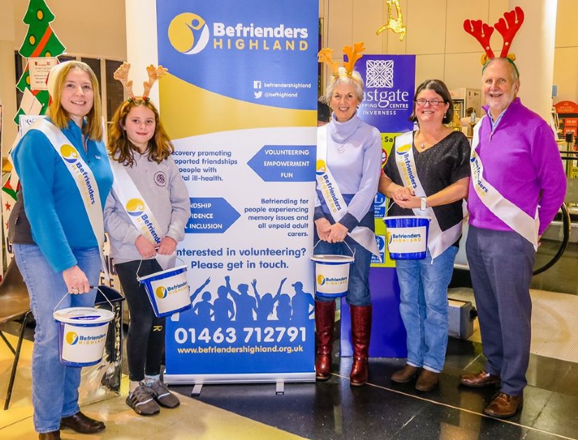 Befrienders Highland Fundraisers with donation buckets